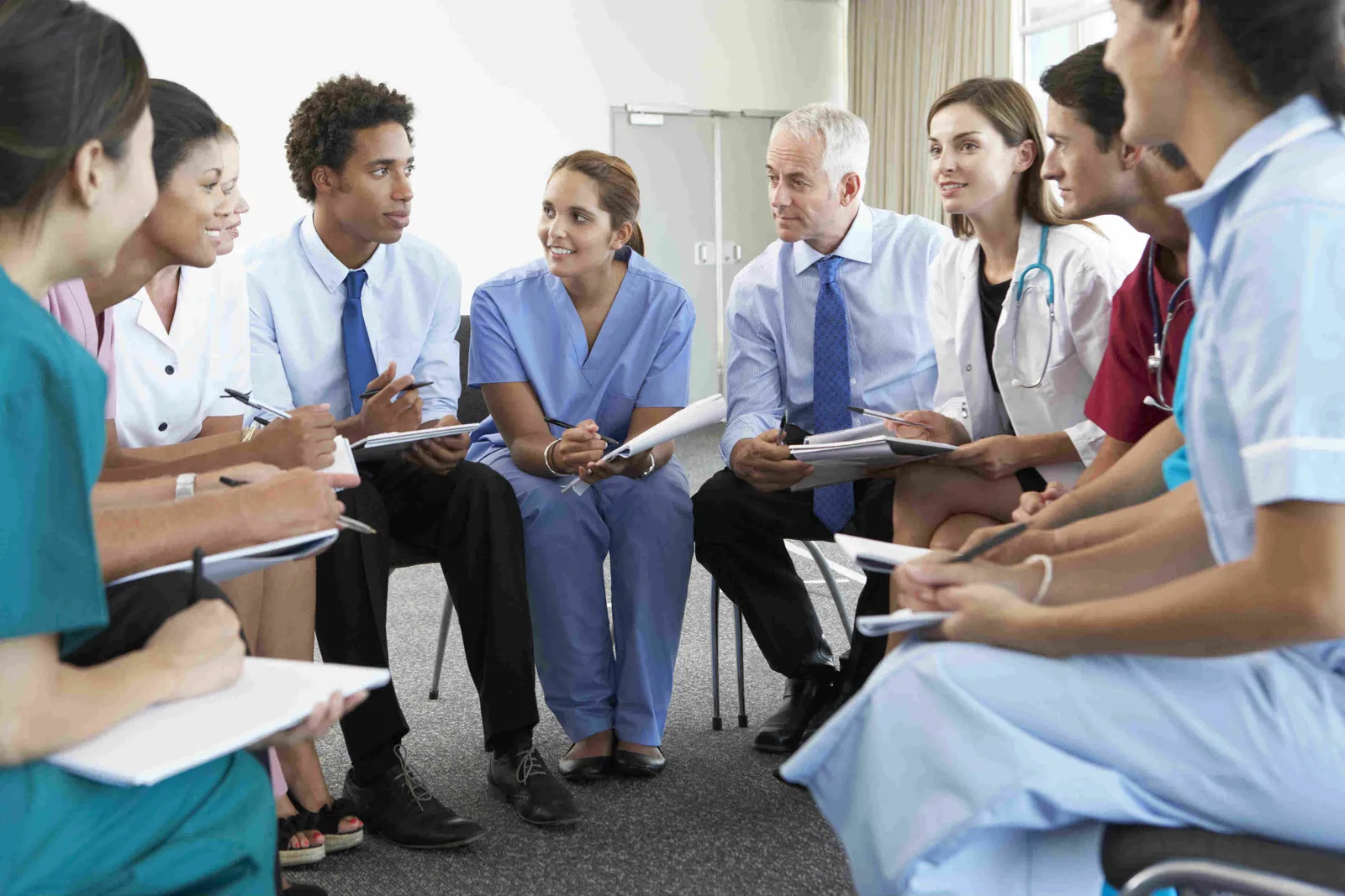 Healthcare professionals meeting around a table